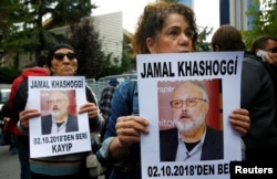 FILE - Human rights activists hold pictures of Saudi journalist Jamal Khashoggi during a protest outside the Saudi Consulate in Istanbul, Turkey, Oct. 9, 2018.