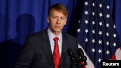 Consumer Financial Protection Bureau Director Richard Cordray speaks in Washington, Oct. 17, 2014.