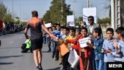 1er Marathon de Téhéran le 7 avril 2017. Les femmes ne sont pas autorisées à courir dans la rue.