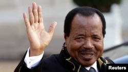 FILE - Cameroon's President Paul Biya departing meeting at Elysee Palace, Paris, Jan. 30, 2013.