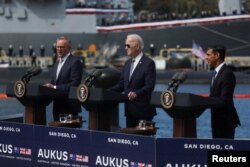 ABD Başkanı Joe Biden, Avustralya Başbakanı Anthony Albanese ve İngiltere Başbakanı Rishi Sunak, 13 Mart 2023.