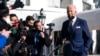 Presiden Joe Biden berbicara kepada wartawan sebelum menaiki Marine One di South Lawn Gedung Putih, 11 Januari 2022, di Washington. (Foto: AP)