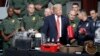 President Donald Trump is shown methods of narcotics smuggling during a tour of U.S. Customs and Border Protection Border equipment at their airport hanger at Marine Corps Air Station Yuma, Aug. 22, 2017, in Yuma, Arizona.
