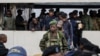 Former members of the Armed Forces of the Democratic Republic of Congo and police officers who allegedly surrendered to M23 rebels arrive in Goma, Congo, Feb. 23, 2025. President Felix Tshisekedi said he is going to launch a unity government.