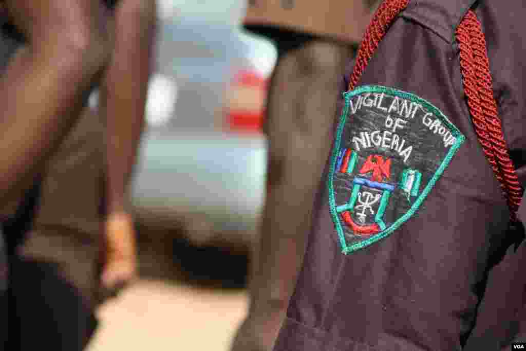 Across Nigeria, thousands of men and women volunteer to be ‘vigilantes,’ patrolling neighborhoods to provide information to security forces,Kaduna, Nigeria, Feb. 14, 2014. (Heather Murdock/VOA)