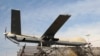 FILE - An Iranian combat drone is seen in Tehran, Iran, Feb. 11, 2016. A recently released report says that while the global focus has been on the adaptation of unmanned aerial systems in the Middle East, drones are becoming part of the tool kit for violent actors across Africa. 