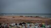 An uncontained garbage dump lies next to Virage Beach in Dakar, Senegal. (A. Hammerschlag/VOA)