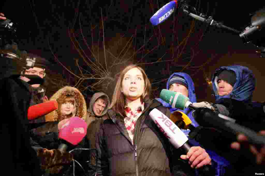 Pussy Riot member Nadezhda Tolokonnikova speaks to the media after she was released from prison in Krasnoyarsk, Russia, Dec. 23, 2013. 