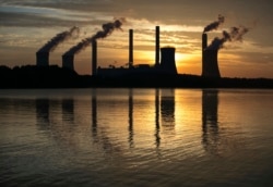 FILE - The coal-fired Plant Scherer in Juliette, Ga., June 3, 2017. The Trump administration is doing away with a decades-old air emissions policy opposed by fossil fuel companies, a move that environmental groups say will result in more pollution.