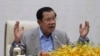 FILE: Cambodia's Prime Minister Hun Sen gestures during a speech on the current state of a new virus from China in Phnom Penh, Cambodia, Thursday, Jan. 30, 2020. Cambodia's leader has urged citizens to remain calm about the new virus from China, which has been confirmed in a sing