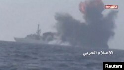 An explosion is seen onboard what is believed to be a Saudi warship, off the western coast of Yemen in this still frame taken from video posted by Houthi-run al-Masirah television on their social media website, and obtained by Reuters, Jan. 31, 2017.