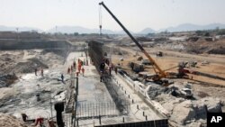 The construction of the dam in Asosa region Ethiopia, Apr. 2, 2013. Ethiopia started to divert the flow of the Blue Nile river to construct a giant dam, a move that could impact the Nile-dependent Egypt.