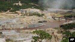 FILE - The Blue Nile river flows near the site of the Grand Ethiopian Renaissance Dam near Asosa, Ethiopia, June 28, 2013.