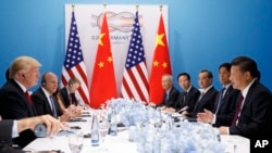 Le président américain lors de sa rencontre avec son homologue chinois, au sommet du G20, le 8 juillet 2017.