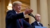 Le président américain Donald Trump, à gauche, lors d’une conférence de presse avec son homologue russe, Vladimir Poutine, au palais présidentiel à Helsinki, Finlande, 16 juillet 2018.