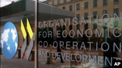The Organization for Economic Cooperation(OECD) expects the world economy to rebound and grow by 5.6 percent in 2021 and by 4 percent in 2022.