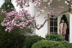 FILE - President Donald Trump's personal secretary Madeleine Westerhout stands outside the Oval Office of the White House in Washington, April 2, 2018.