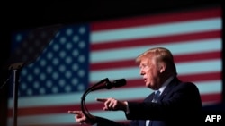 FILE - U.S. President Donald Trump speaks during a campaign event in Miami, Florida, Jan. 3, 2020.