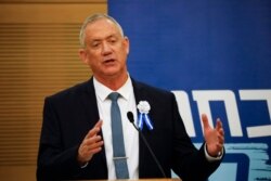 Blue and white party leader Benny Gantz speak during his party's faction meeting in Jerusalem, Oct. 3, 2019.