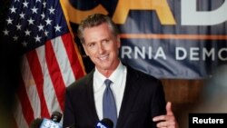 California Governor Gavin Newsom speaks after the polls close on the recall election, at the California Democratic Party headquarters in Sacramento, Sept. 14, 2021.