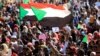 Des manifestants soudanais lors d'un rassemblement sur la Place Verte à Khartoum, au Soudan, le 18 juillet 2019.