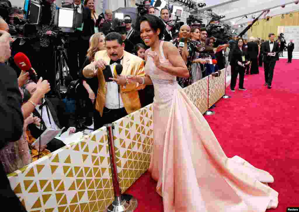 Regina King reacts on the red carpet during the Oscars arrivals at the 92nd Academy Awards in Hollywood, Feb. 9, 2020.