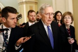 Senate Majority Leader Mitch McConnell of Ky., speaks with reporters on Capitol Hill in Washington, Dec. 19, 2019.