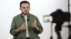 Azerbaijani journalist says he was jailed over his work 