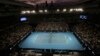 Nick Kyrgios dari Australia (kanan), dan Dominic Thiem dari Austria berhadapan dalam pertandingan putaran ketiga, kejuaraan tenis Australia Terbuka di Melbourne, Australia, Jumat, 12 Februari 2021. (AP Photo / Hamish Blair)