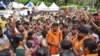 Protesters who are opposed to allowing women of menstruating age to enter the Sabarimala temple chant devotional hymns as they gather at Nilackal, a base camp on way to the mountain shrine in Kerala, India, Oct. 17, 2018. 