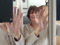 VOA Geneva reporter Lisa Schlein poses for a selfie at home, where she is sheltering in place during the Coronavirus lockdown. (Photo: Lisa Schlein / VOA)