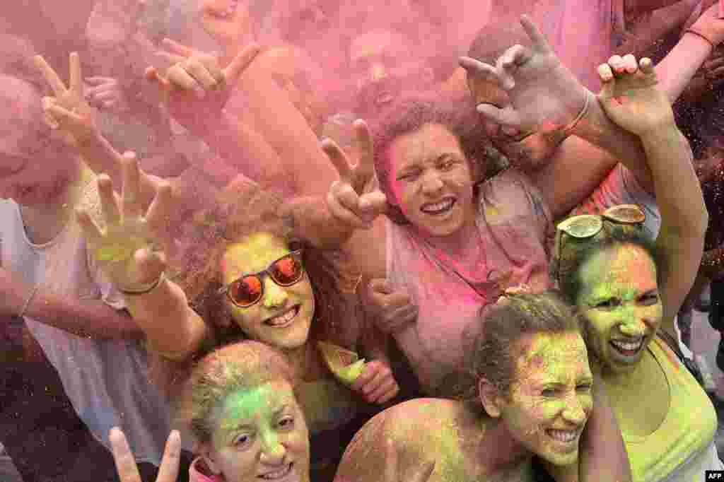 People take part in the "Roma Colours" event in Rome, Italy.