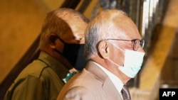 Malaysia former prime minister Najib Razak, right, arrives at the court of appeal in Putrajaya on April 5, 2021. 