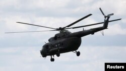 A Russian-made MI-17 helicopter of the Colombian army is seen flying in Meta, Colombia Jan. 14, 2018.