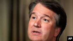 FILE - Brett Kavanaugh answers questions during a Fox News interview, Sept. 24, 2018, in Washington, about allegations of sexual misconduct made against him.