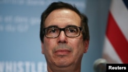 FILE - U.S. Secretary of the Treasury Steven Mnuchin holds a news conference after the G7 Finance Ministers Summit in Whistler, British Columbia, Canada, June 2, 2018.