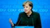Merkel Heads to EU-Africa Summit with Eye on Migrant Issue