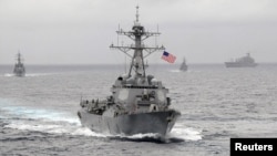 FILE - The guided-missile destroyer USS Lassen sails in the Pacific Ocean in a November 2009 photo provided by the U.S. Navy. 