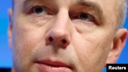 FILE - Russia's Finance Minister Anton Siluanov holding a news briefing in Washington. 