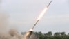 This picture taken on Aug. 27, 2024 and released from North Korea's official Korean Central News Agency (KCNA) via KNS on Aug. 28, 2024 shows a test-fire of the 240mm rocket artillery weapon system at an undisclosed location in North Korea.
