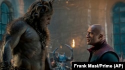 This image released by Prime shows Kristofer Hivju, left, and Dwayne Johnson in a scene from "Red One."