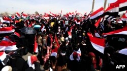 Supporters of Yemen's Houthi rebels attend a rally marking the fourth anniversary of the Saudi-led coalition's intervention in Yemen, in the capital Sanaa, March 26, 2019. 