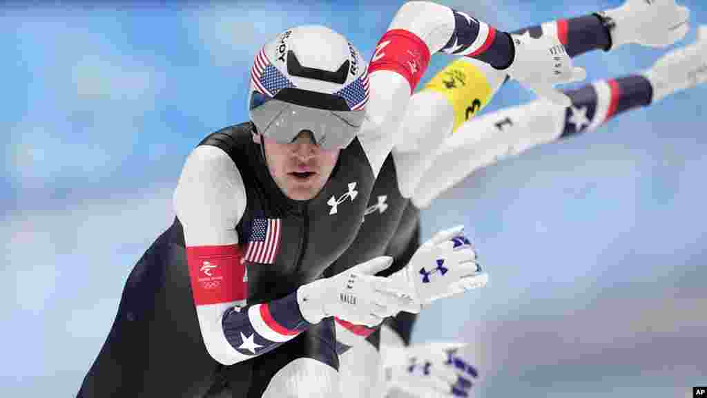 Team United States led by Casey Dawson, with Emery Lehman center and Ethan Cepuran, compete during the speedskating men&#39;s team pursuit semifinals at the 2022 Winter Olympics in Beijing.