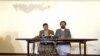 Amin Karim (R), an official of the Hezb-i-Islami Party, speaks during a news conference in Kabul, Afghanistan, March 17, 2016.