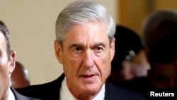 FILE - Special Counsel Robert Mueller departs after briefing members of the U.S. Senate on his investigation into potential collusion between Russia and the Trump campaign on Capitol Hill in Washington, June 21, 2017.