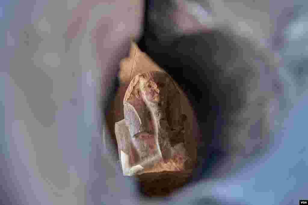 A statue of King Netjerykhet (C2667-2648BC), also known as Djoser, inside a stone booth near the Djoser Pyramid's entrance. (H. Elrasam/VOA)
