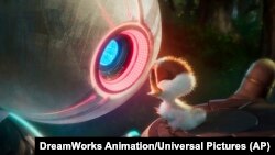 This image released by Universal Pictures shows Roz, voiced by Lupita N'yongo, left, and Brightbill, voiced by Kit Connor, in a scene from DreamWorks Animation's "Wild Robot." 