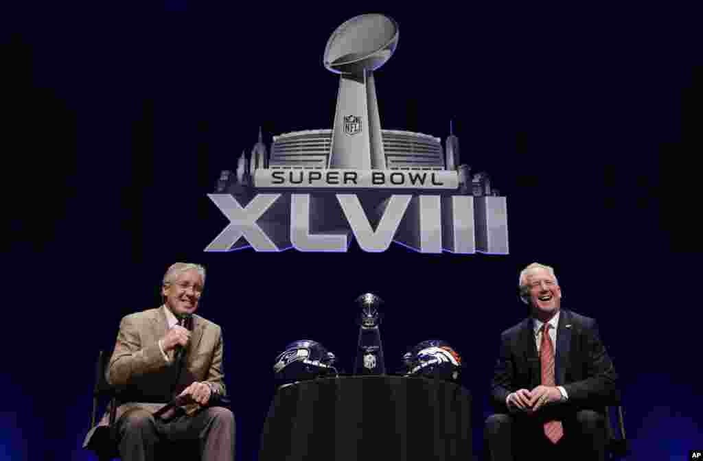 Seattle Seahawks head coach Pete Carroll and Denver Broncos head coach John Fox speak at a news conference, Jan. 31, 2014, in New York.