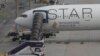 Pesawat Boeing 777-300ER milik Singapore Airlines, diparkir di Bandara Internasional Suvarnabhumi, dekat Bangkok, Thailand, Rabu, 22 Mei 2024, setelah penerbangan SQ321 London-Singapura yang mengalami turbulensi parah. (AP/Sakchai Lalit)