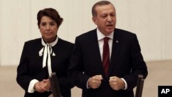 Turkey's President Recep Tayyip Erdogan addresses the parliament in Ankara, Turkey, Oct. 1, 2016. 